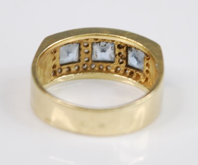 Lot 2504 - A yellow metal topaz dress ring, comprising...