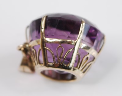 Lot 2506 - A yellow metal amethyst pendant and ring set,...