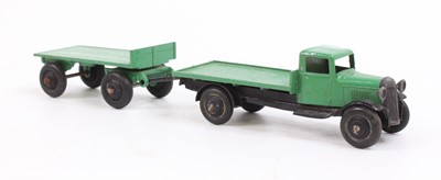 Lot 1115 - Dinky 25t Flat Truck, finished in green, black...