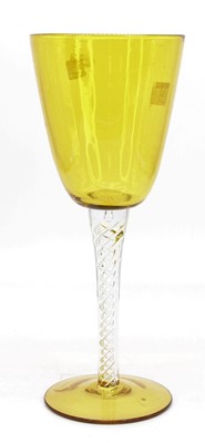 Lot 24 - An oversized wine glass, the yellow round...
