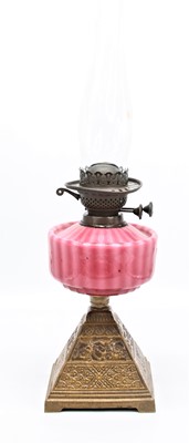 Lot 25 - A late 19th century brass oil lamp, having a...