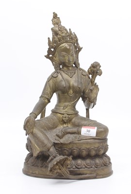 Lot 30 - A brass figure of the Tibetan deity Tara,...