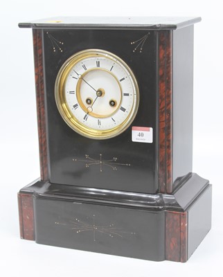 Lot 40 - A Victorian black slate mantel clock, the...