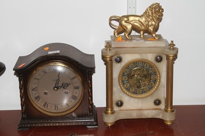 Lot 61 - An early 20th century mantel clock, surmounted...