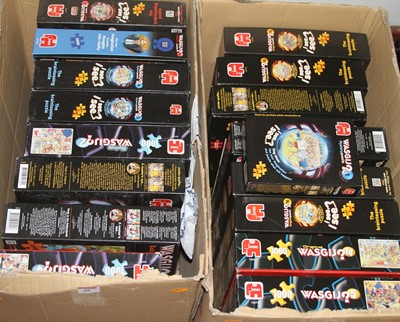 Lot 88 - Two boxes of jigsaw puzzles