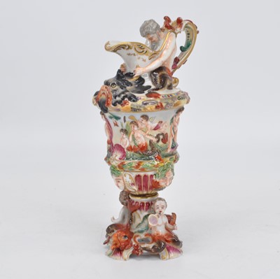 Lot 112 - A Naples porcelain ewer, relief decorated with...