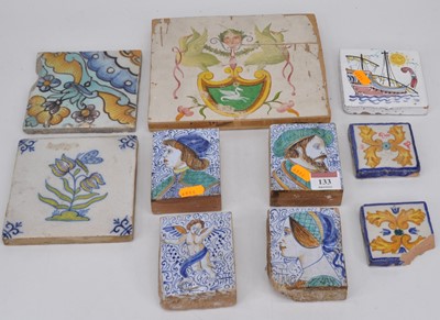 Lot 133 - A collection of 9 various polychrome wall tiles