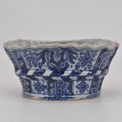 Lot 138 - A Delft blue & white bough pot, decorated with...