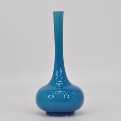 Lot 142 - A late Victorian turquoise glazed bottle vase,...