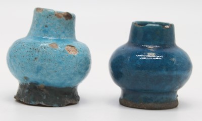 Lot 160 - A near pair of turquoise glazed vases, each of...