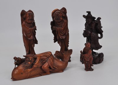 Lot 164 - A collection of five Japanese carved okimono,...