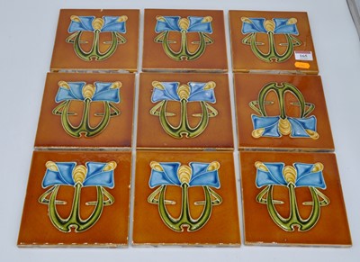 Lot 165 - A set of nine art nouveau polychrome wall...