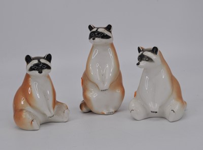 Lot 166 - A set of three Lomonosov models of red pandas,...