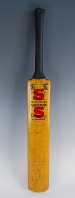 Lot 1276 - A Stuart Surridge cricket bat, signed to the...
