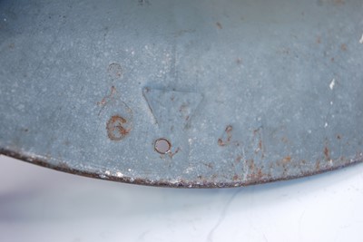Lot 560 - A WW II Zuckerman steel helmet, in grey finish...