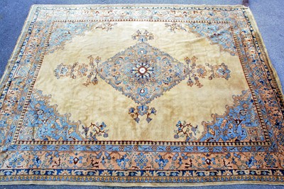 Lot 2725 - A Turkish woollen Ishafan carpet, the tan...