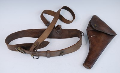 Lot 554 - A WW I leather Sam Browne belt with brass...
