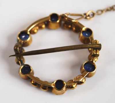 Lot 2552 - A yellow metal sapphire and pearl open...