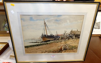 Lot 1010 - John Wordsley - Boats on the beach at...