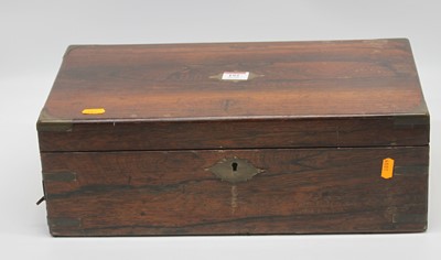 Lot 192 - A 19th century rosewood writing slope, the lid...