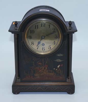 Lot 214 - An early 20th century mantel clock, the brass...