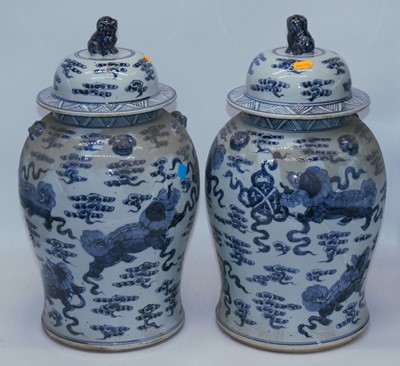 Lot 219 - A pair of Chinese blue & white temple jars,...