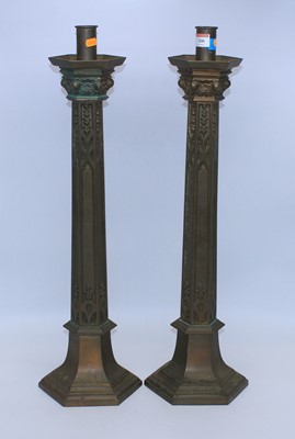 Lot 266 - A pair of hexagonal brass altar candlesticks,...