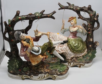 Lot 265 - A pair of Capodimonte figures, each shown...