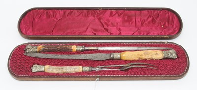 Lot 330 - A Victorian three piece carving set having...