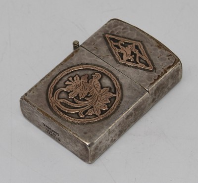 Lot 349 - A 20th century textured white metal zippo type...