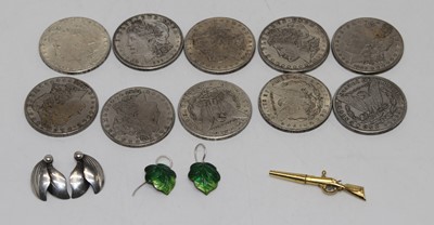 Lot 352 - A pair of white metal and green enamelled drop...