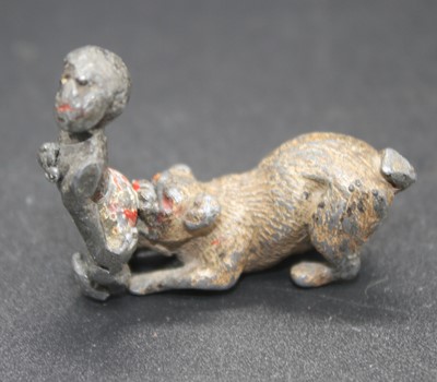 Lot 405 - A 19th century cold painted lead figure of a...