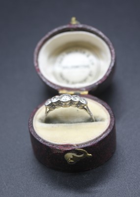 Lot 419 - An Edwardian white metal diamond five stone...