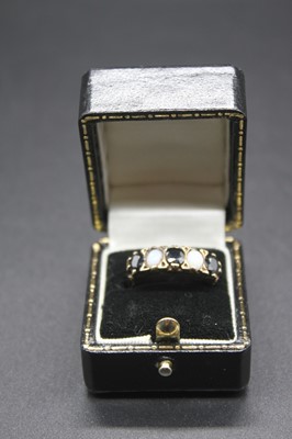 Lot 421 - An Edwardian style 9ct gold, sapphire and opal...