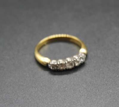 Lot 432 - An 18ct gold diamond five stone ring, size L, 3g