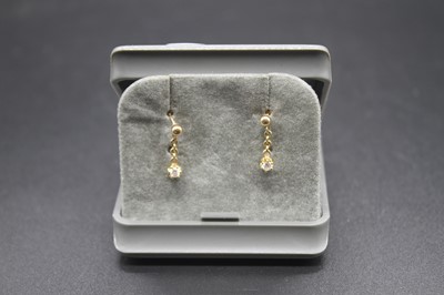 Lot 451 - A pair of modern 9ct gold diamond set ear...