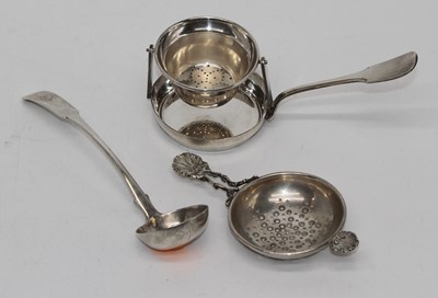 Lot 356 - An early C20th French white metal tea strainer,...