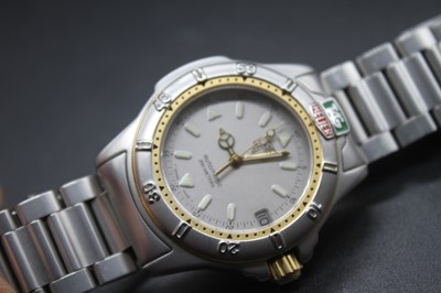 Lot 464 - A Tag Heuer steel cased mid-size automatic...