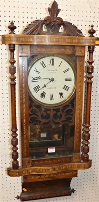 Lot 1173 - A late Victorian walnut and chequer inlaid...