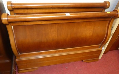 Lot 1180 - A contemporary cherry wood single sleigh bed,...