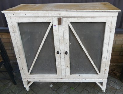 Lot 1206 - A white painted pine and mesh grille inset...