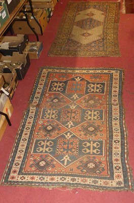 Lot 1219 - A Turkish woollen red ground hall rug, with...