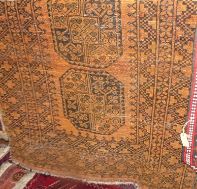 Lot 1224 - A Persian woollen rust ground Bokhara rug, 170...