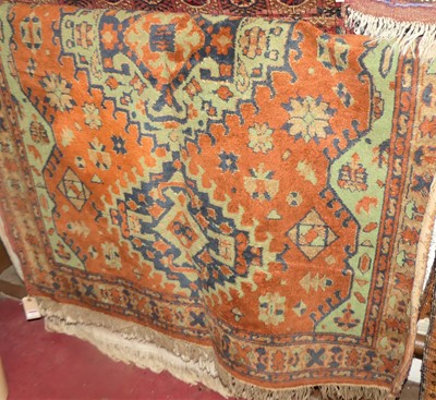 Lot 1227 - A Persian woollen red ground Shiraz rug;...