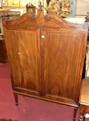 Lot 1241 - A 19th century mahogany double door cabinet on...