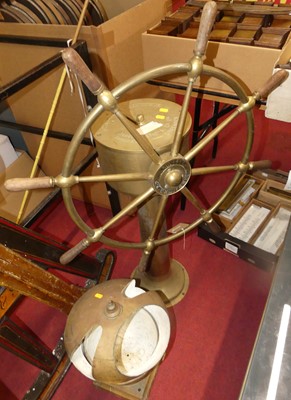 Lot 1247 - A brass freestanding ships wheel by John...