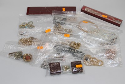 Lot 384 - A collection of costume jewellery to include...