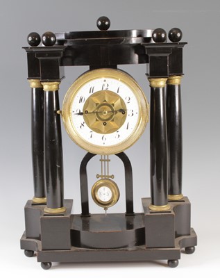 Lot 4413 - A 19th century ebonised mantel clock of...