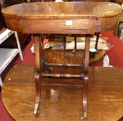 Lot 1254 - A Regency rosewood work table, having sliding...