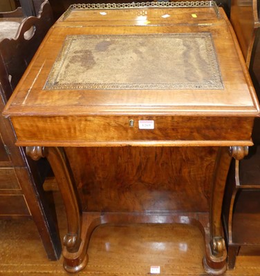 Lot 1269 - A mid-Victorian figured walnut slopefront...